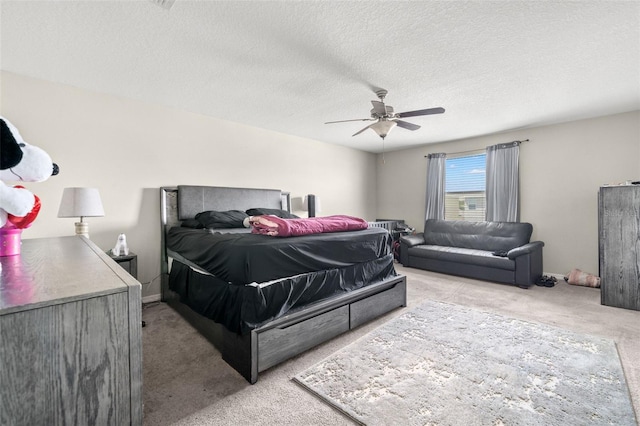 6708 Hazelnut Spice Dr, Ruskin, FL 33573 - bedroom featuring a ceiling fan, a textured ceiling, and light colored carpet