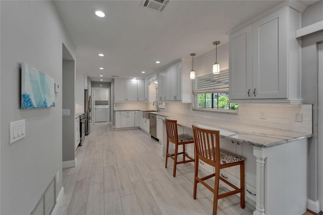kitchen with visible vents, recessed lighting, tasteful backsplash, and stainless steel appliances