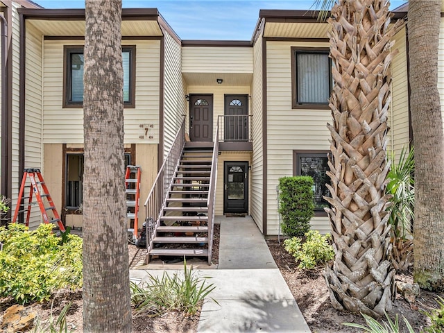 view of front of home with stairs
