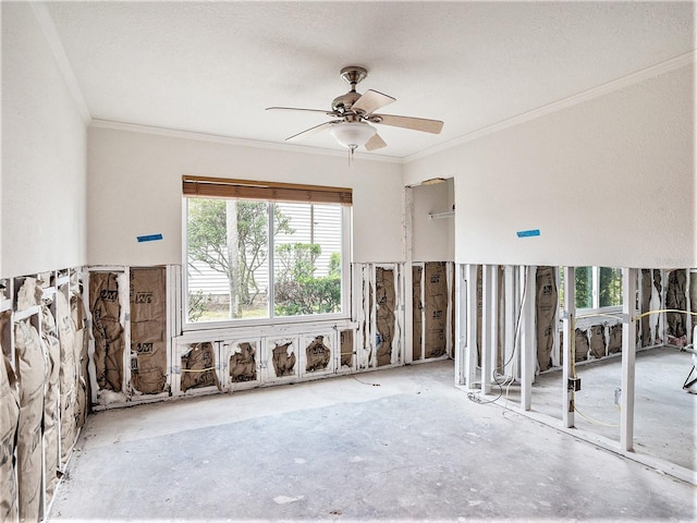 unfurnished room featuring crown molding, a ceiling fan, and a wealth of natural light