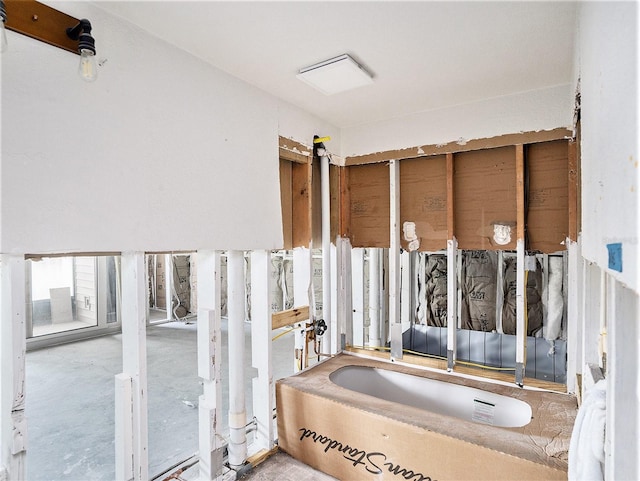 bathroom with concrete flooring