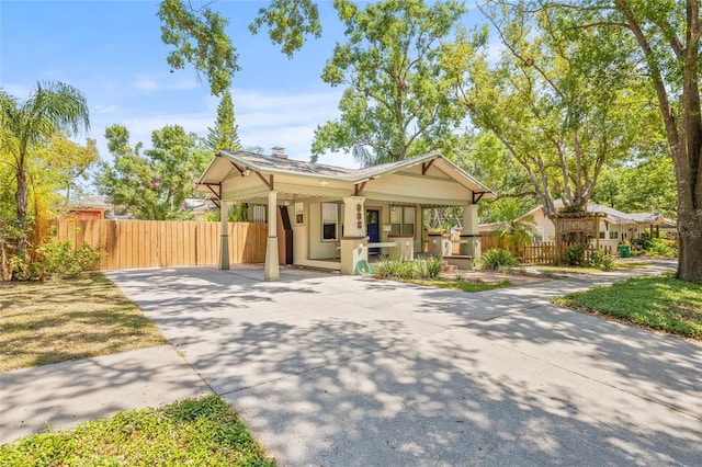 906 E Broad St, Tampa, FL 33604 - view of front of house with driveway and a porch