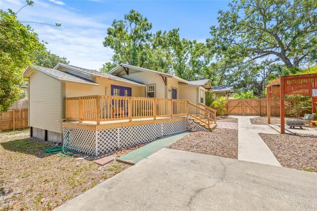 906 E Broad St, Tampa, FL 33604 - back of house with a deck and a patio area