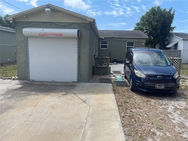 2435 37th Ave N, Saint Petersburg, FL 33713 - view of home's exterior with stucco siding and concrete driveway