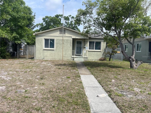 2435 37th Ave N, Saint Petersburg, FL 33713 - bungalow featuring stucco siding and a gate