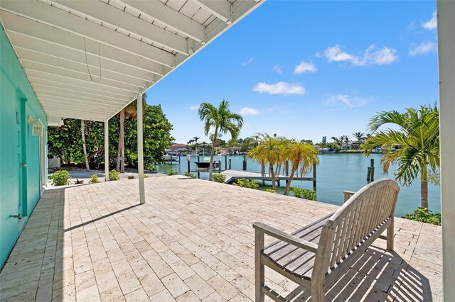 3021 Alton Dr, St Pete Beach, FL 33706 - view of patio / terrace featuring a water view and a boat dock