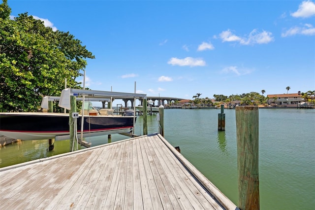 3021 Alton Dr, St Pete Beach, FL 33706 - dock with boat lift and a water view