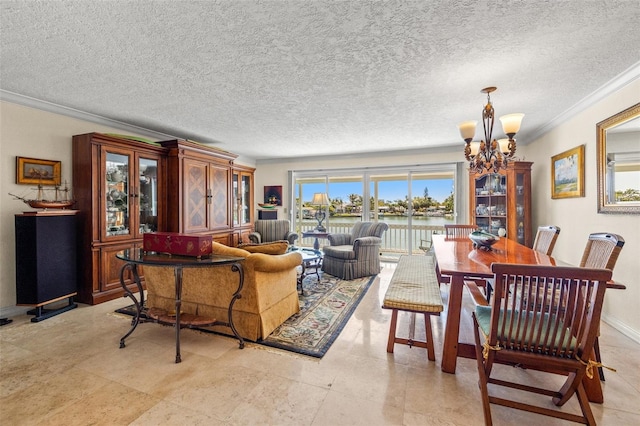 3021 Alton Dr, St Pete Beach, FL 33706 - living room featuring a chandelier, ornamental molding, a water view, baseboards, and a textured ceiling