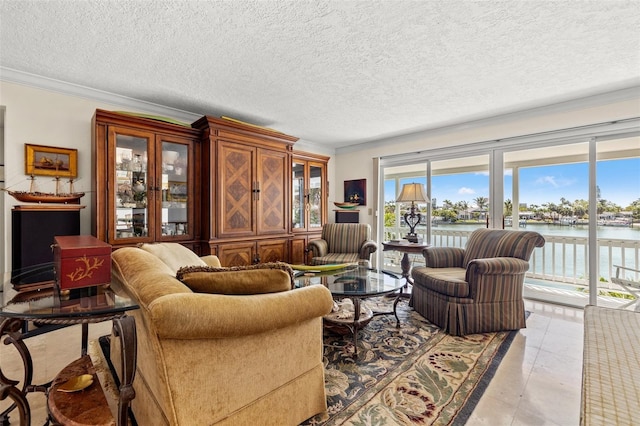 3021 Alton Dr, St Pete Beach, FL 33706 - living area with crown molding, a water view, and a textured ceiling