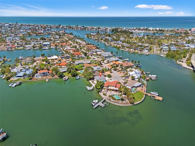 3021 Alton Dr, St Pete Beach, FL 33706 - aerial view of property and surrounding area with a nearby body of water and nearby suburban area