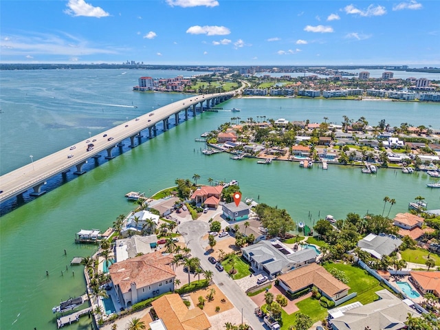 3021 Alton Dr, St Pete Beach, FL 33706 - aerial view of residential area featuring a notable bridge and a large body of water