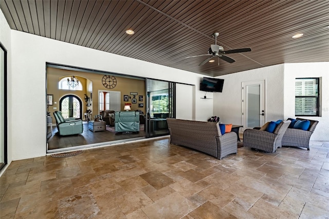 view of patio featuring french doors, a ceiling fan, and outdoor lounge area