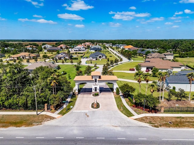 birds eye view of property with a residential view
