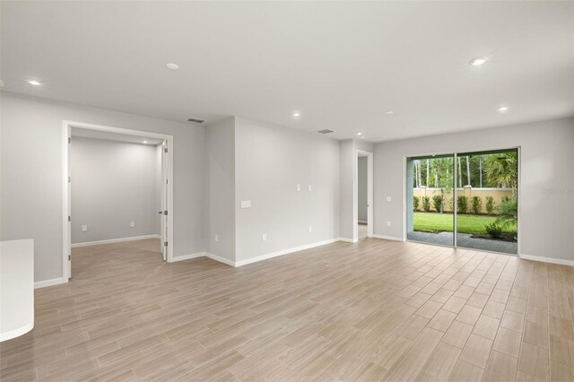 20423 Symphony Pl, Venice, FL 34293 - unfurnished room with recessed lighting, light wood finished floors, and baseboards
