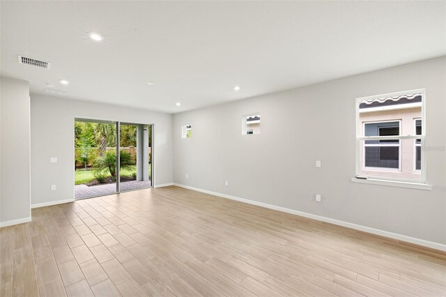 20423 Symphony Pl, Venice, FL 34293 - unfurnished room featuring baseboards, recessed lighting, and light wood-type flooring