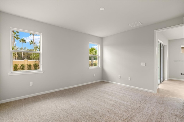 20423 Symphony Pl, Venice, FL 34293 - unfurnished room featuring baseboards and light colored carpet