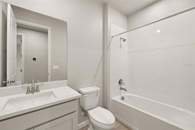 20423 Symphony Pl, Venice, FL 34293 - bathroom with toilet, vanity, and shower / washtub combination
