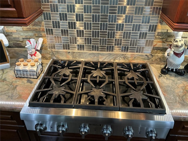 324 6th Ave, Indian Rocks Beach, FL 33785 - details featuring cooktop, stove, and backsplash