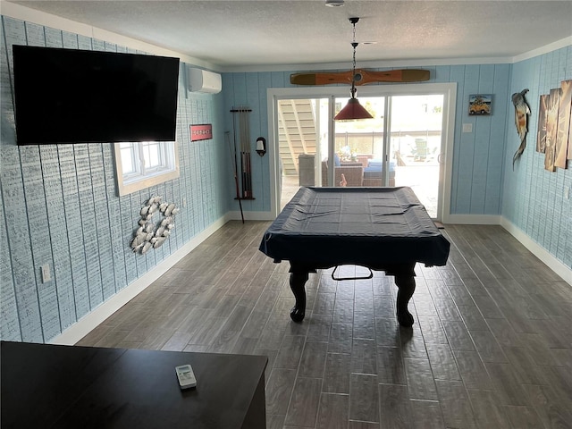 324 6th Ave, Indian Rocks Beach, FL 33785 - recreation room with billiards, baseboards, a wall mounted air conditioner, and wood finished floors
