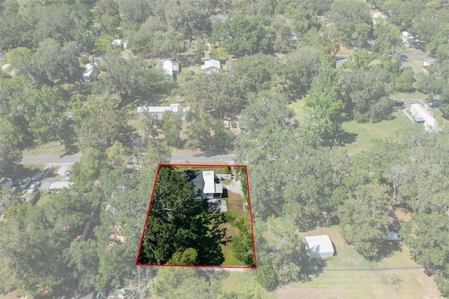 aerial view featuring a view of trees