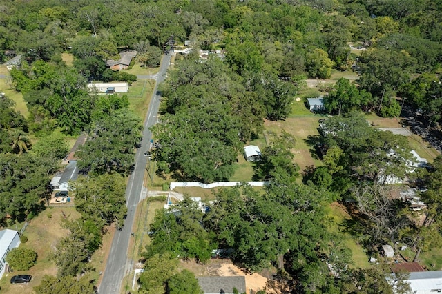 bird's eye view featuring a forest view