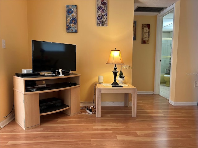 1301 S Hercules Ave Unit 19, Clearwater, FL 33764 - living area featuring wood finished floors and baseboards