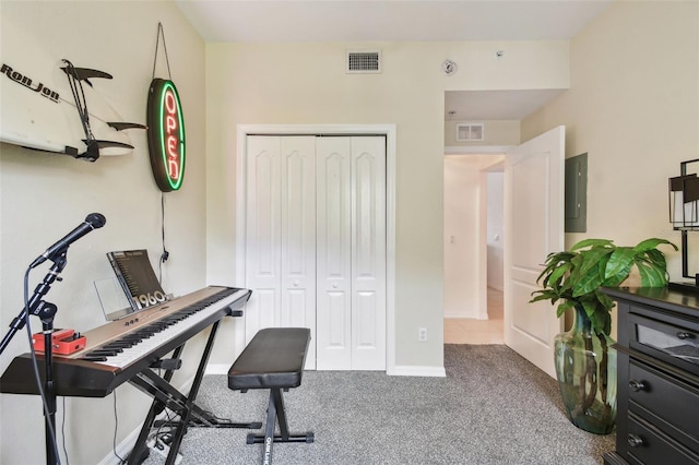 1003 Fairwaycove Ln Unit 103, Bradenton, FL 34212 - office area with carpet, electric panel, and baseboards