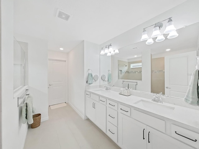 17737 Everlong Dr, Land O Lakes, FL 34638 - full bathroom featuring a sink, recessed lighting, double vanity, and visible vents