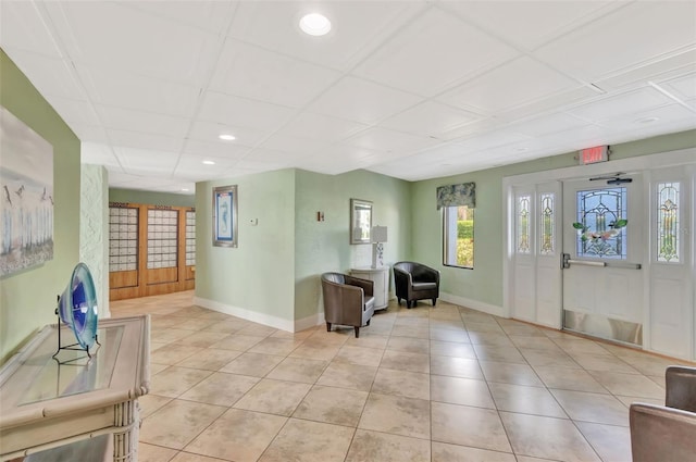 interior space featuring light tile patterned floors, baseboards, and recessed lighting