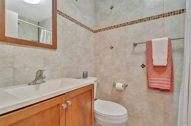 full bathroom featuring vanity, curtained shower, toilet, and tile walls