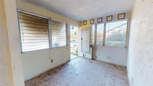 5009 12th Ave S, Gulfport, FL 33707 - spare room with tile patterned floors and a wealth of natural light