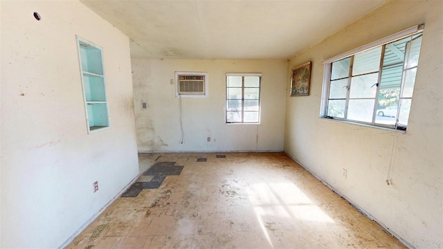 5009 12th Ave S, Gulfport, FL 33707 - spare room with a wall mounted air conditioner