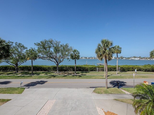 7085 Sunset Dr S Unit A, Saint Petersburg, FL 33707 - view of asphalt road featuring a water view and sidewalks