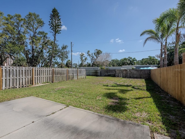 7085 Sunset Dr S Unit A, Saint Petersburg, FL 33707 - view of yard featuring a patio