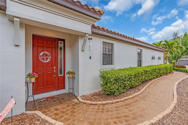 4610 Alexandria Ct, Palmetto, FL 34221 - entrance to property featuring stucco siding