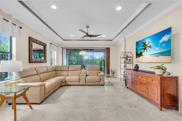 4610 Alexandria Ct, Palmetto, FL 34221 - living area with crown molding, a raised ceiling, a ceiling fan, and recessed lighting