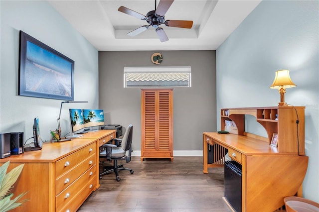 4610 Alexandria Ct, Palmetto, FL 34221 - office area with baseboards, a ceiling fan, a tray ceiling, and wood finished floors