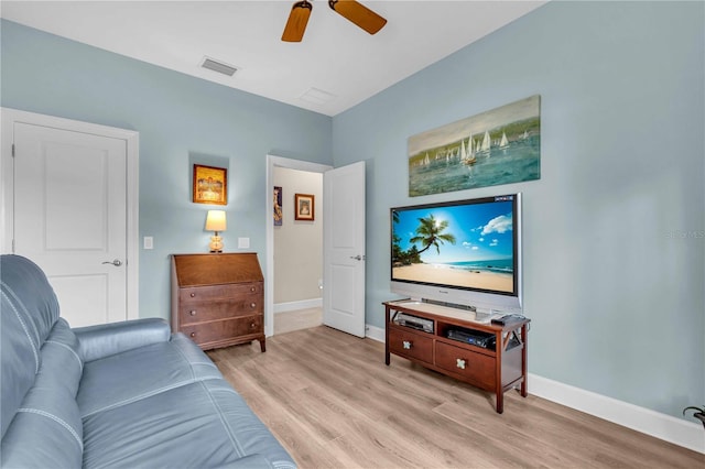 4610 Alexandria Ct, Palmetto, FL 34221 - living area featuring baseboards, ceiling fan, light wood-style flooring, and visible vents