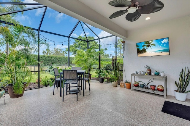 4610 Alexandria Ct, Palmetto, FL 34221 - view of patio featuring outdoor dining area, a lanai, ceiling fan, and fence
