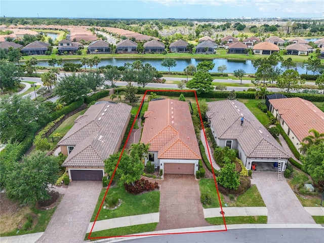 4610 Alexandria Ct, Palmetto, FL 34221 - aerial view featuring a water view and a residential view