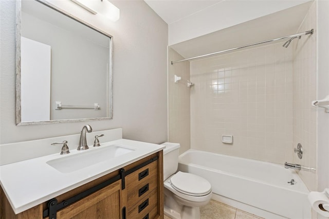 bathroom featuring vanity, tile patterned floors, toilet, and shower / washtub combination