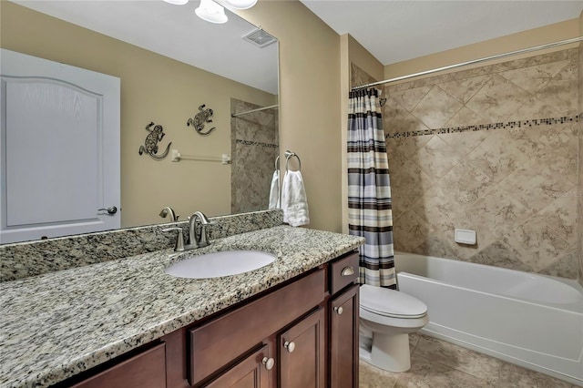 full bath with vanity, toilet, tile patterned floors, shower / bath combo with shower curtain, and visible vents