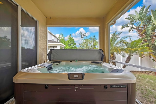 exterior space with a jacuzzi