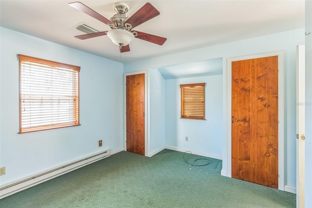 526 Kings Creek Cir, Steinhatchee, FL 32359 - unfurnished bedroom with visible vents, carpet floors, baseboards, ceiling fan, and a baseboard heating unit