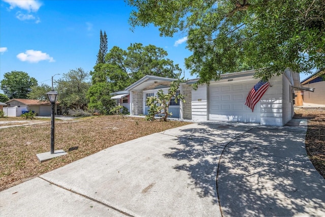 view of front facade with driveway and a garage