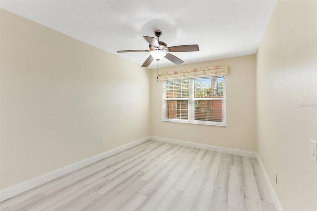 14506 Alejo Ct, Seminole, FL 33776 - empty room featuring ceiling fan, light wood-type flooring, and baseboards