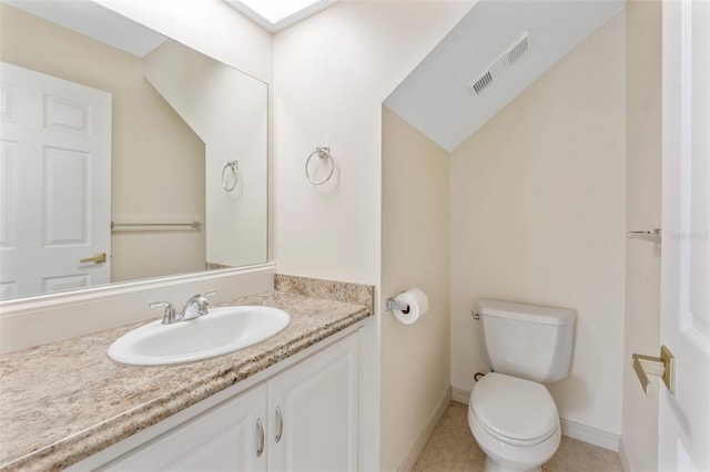 14506 Alejo Ct, Seminole, FL 33776 - half bath featuring toilet, vanity, baseboards, and tile patterned flooring
