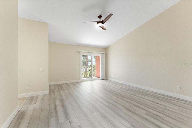 14506 Alejo Ct, Seminole, FL 33776 - unfurnished room with ceiling fan, light wood-type flooring, baseboards, and vaulted ceiling