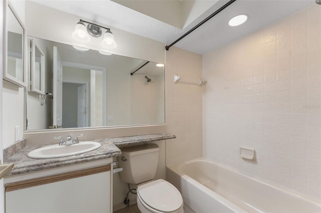 14506 Alejo Ct, Seminole, FL 33776 - full bathroom with toilet,  shower combination, and vanity