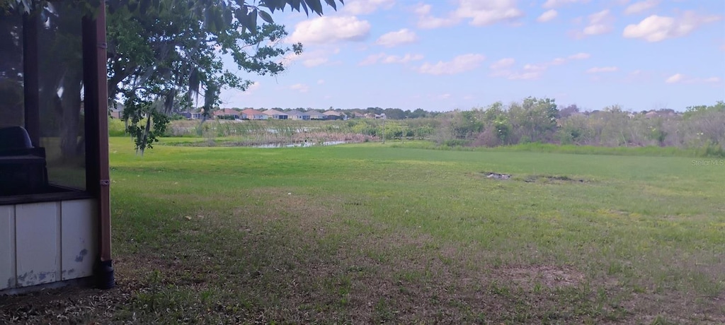 view of yard featuring a water view